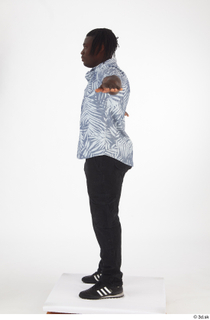 Kato Abimbo black jeans black sneakers casual dressed short sleeve…